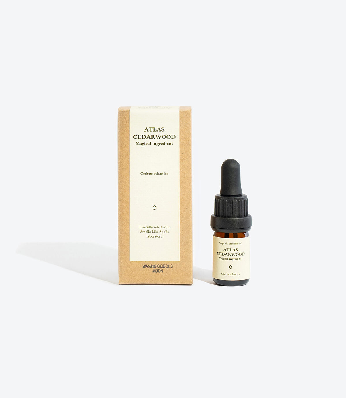 ATLAS CEDARWOOD essential oil bottle, label showing Cedrus atlantica