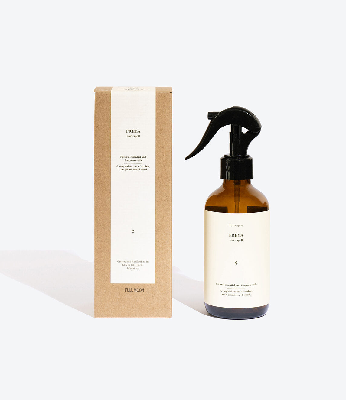 Close-up of FREYA home spray bottle and label
