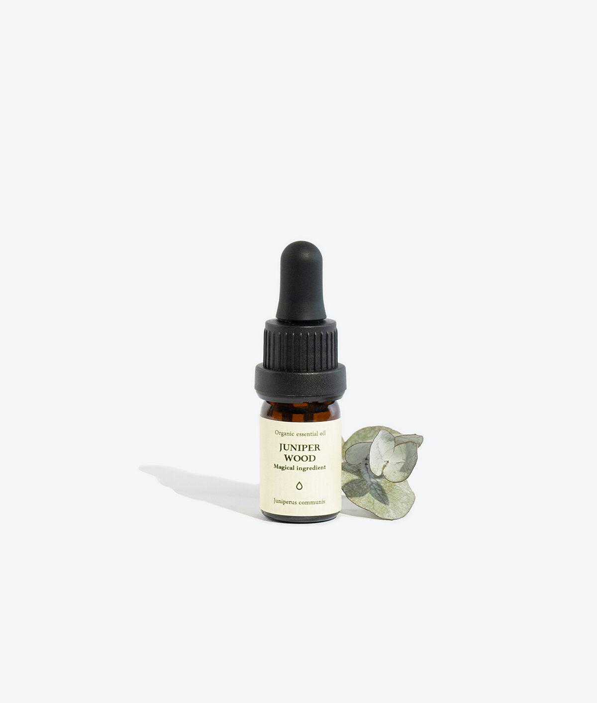 JUNIPER WOOD essential oil bottle, front view with label