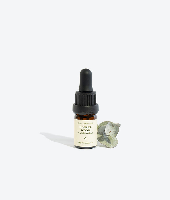 JUNIPER WOOD essential oil bottle, front view with label