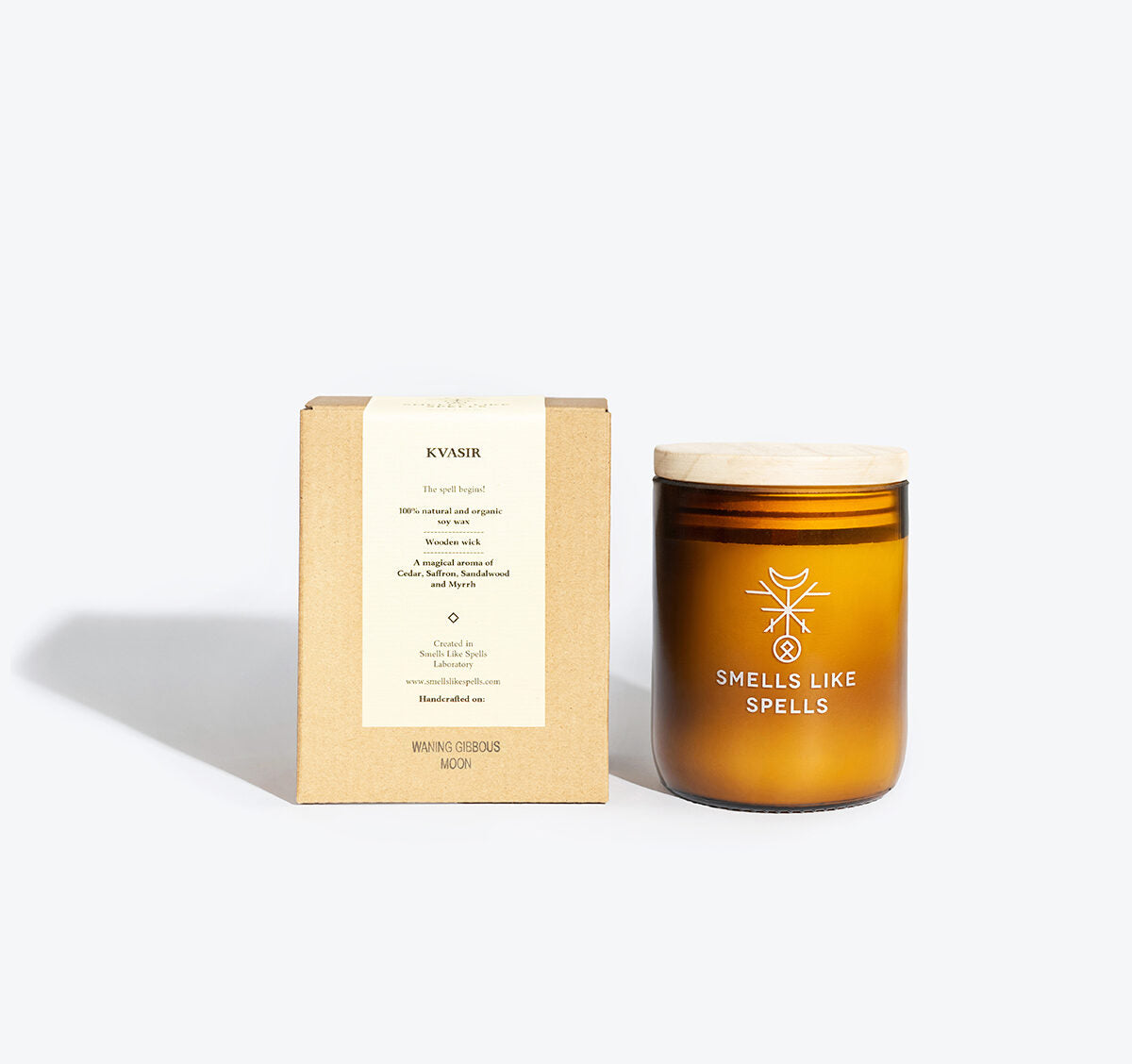 KVASIR scented candle lit, warm glow for a clarity ritual