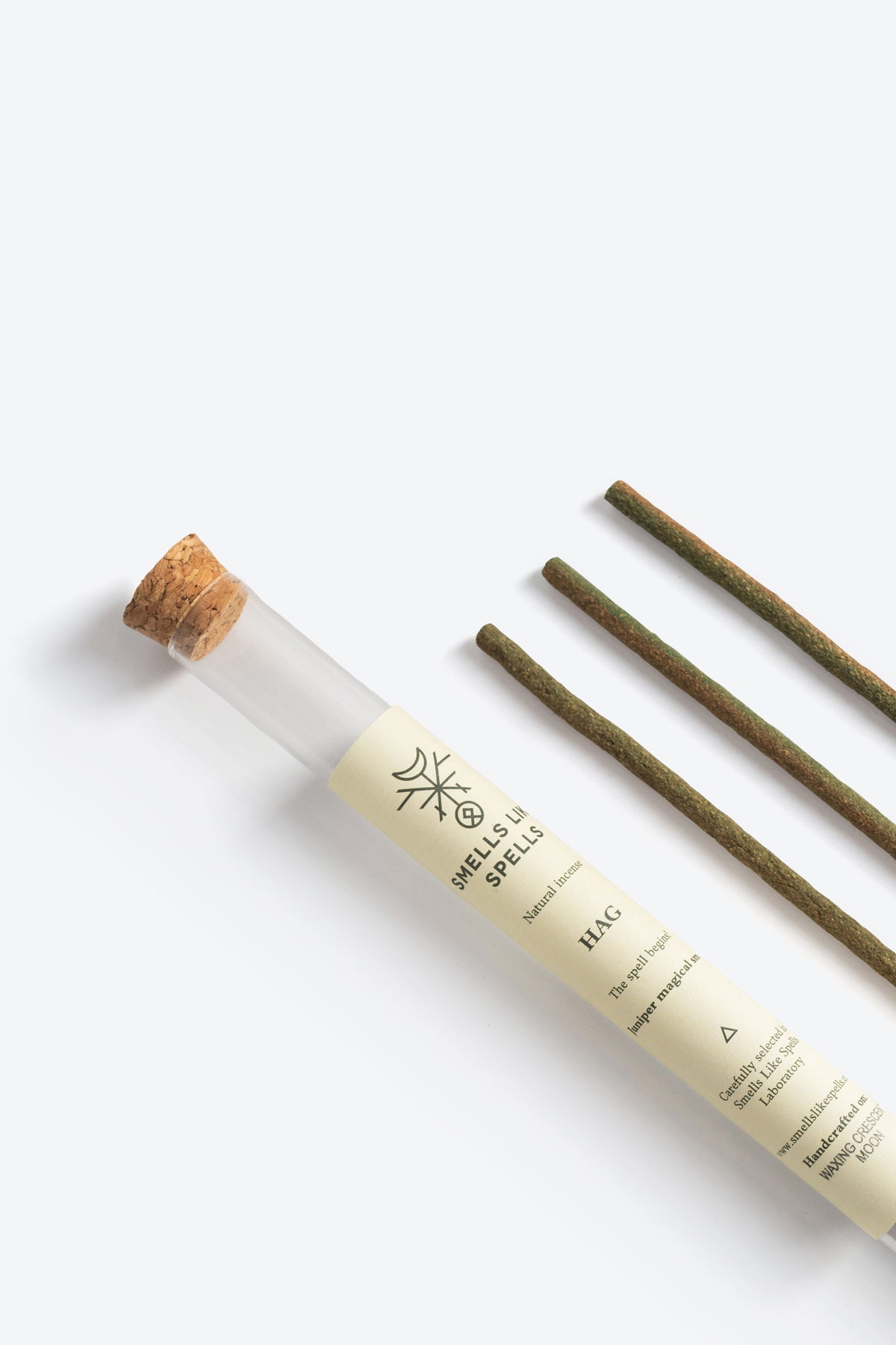 Natural Incense HAG stick lit with rising smoke