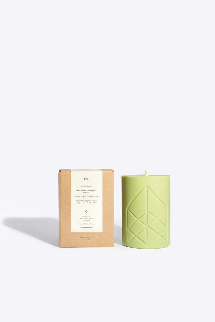 EIR soy wax rune candle, front view showing carved rune symbol