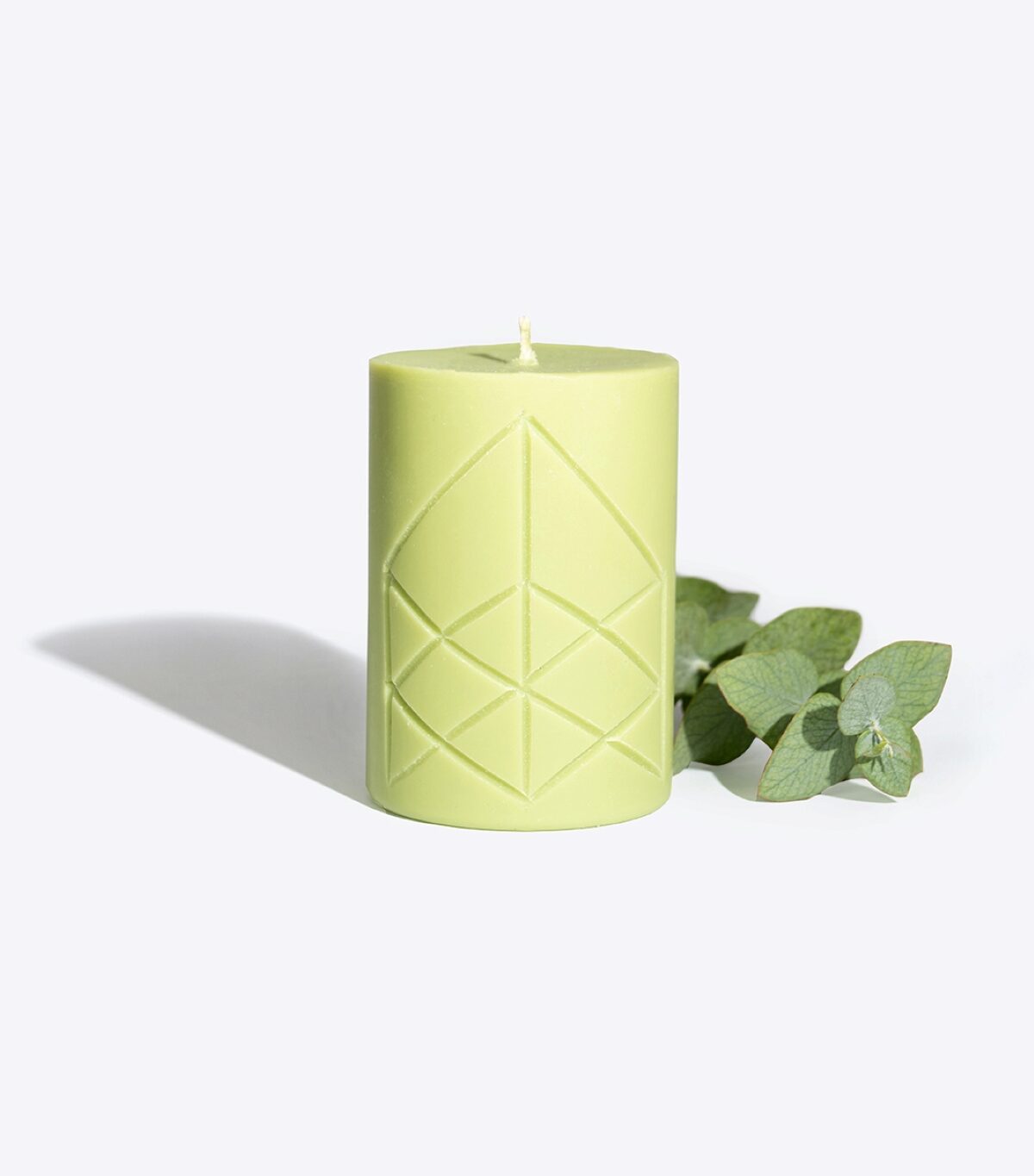 EIR rune candle lit, warm glow for a health and healing ritual