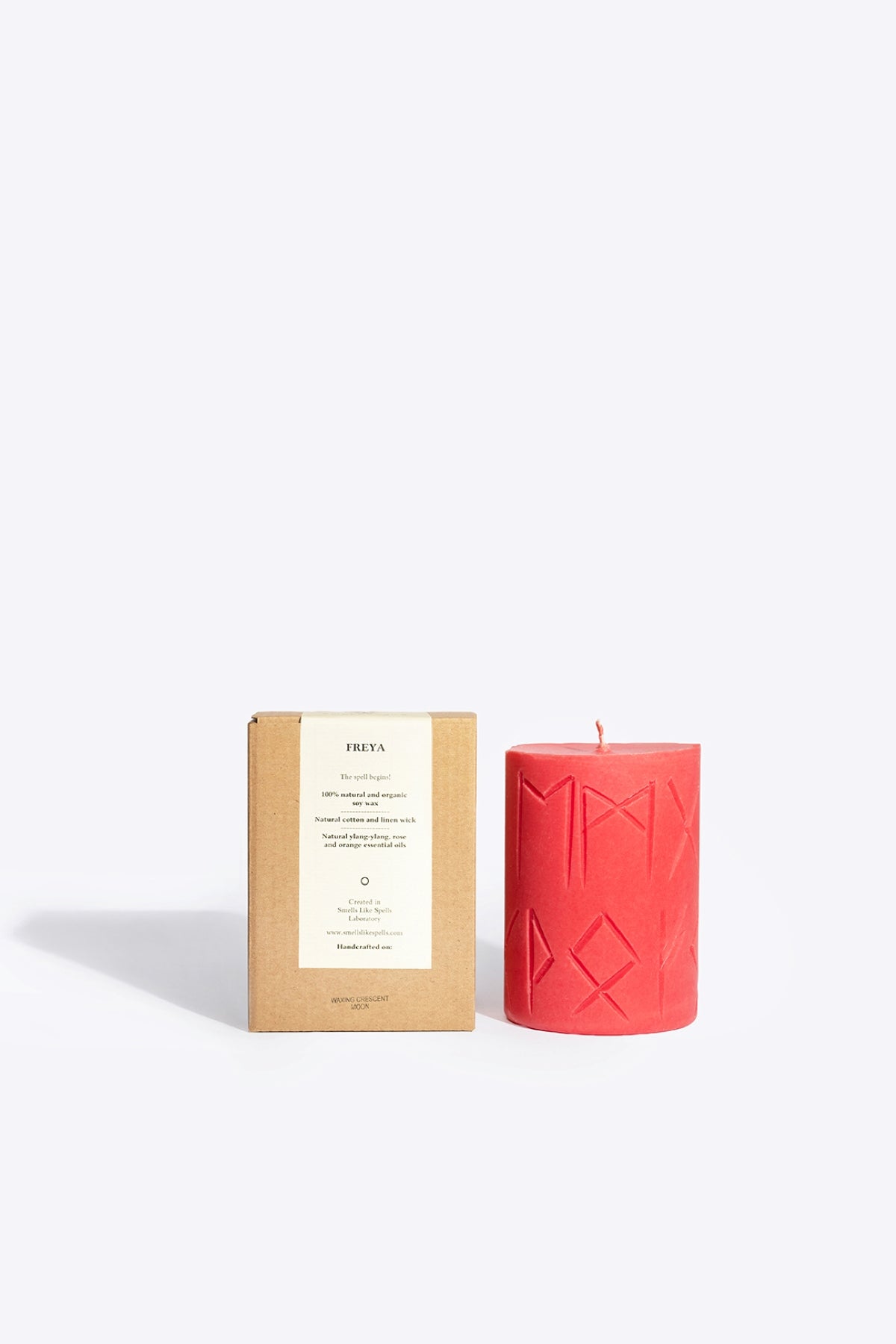 FREYA soy wax rune candle, front view showing carved rune symbol
