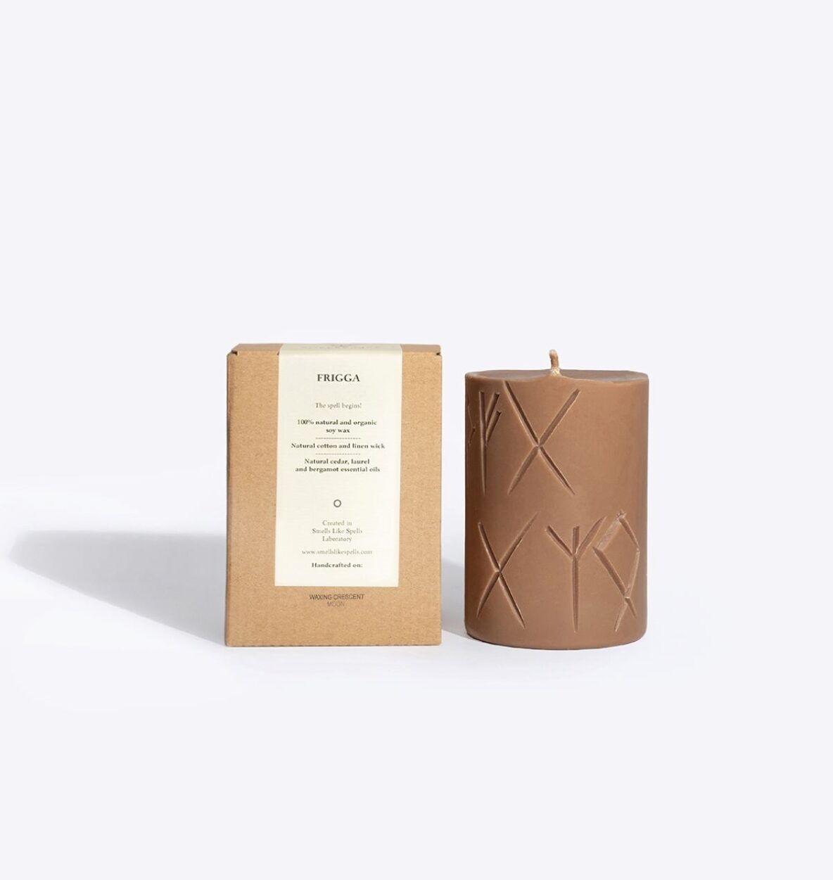 FRIGGA soy wax rune candle, front view showing carved rune symbol