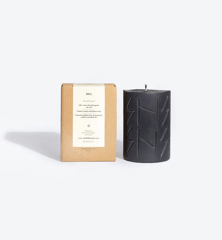 HEL soy wax rune candle, front view showing carved rune symbol