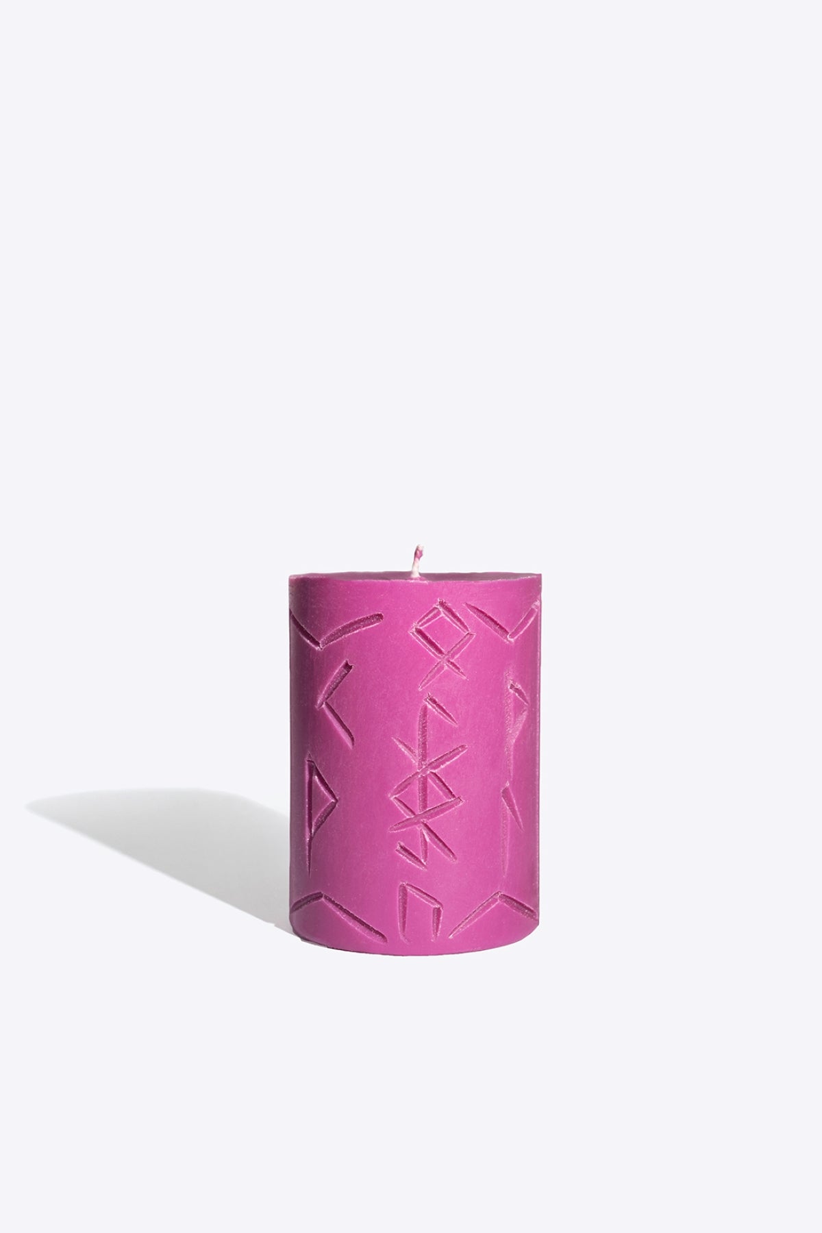 Close-up of MIMIR rune candle wax and wick