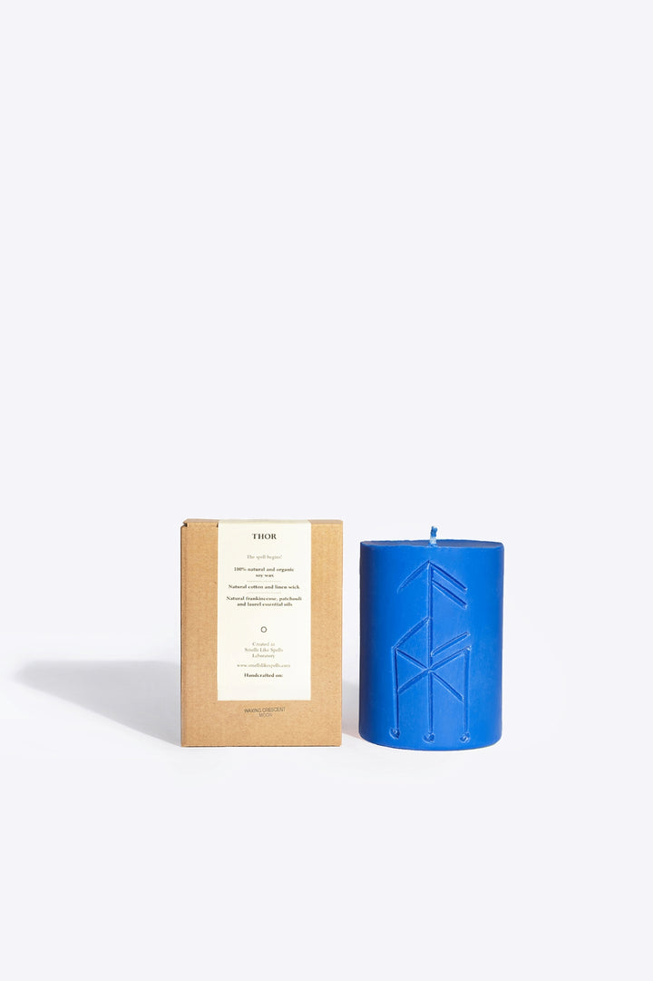 THOR soy wax rune candle, front view showing carved rune symbol