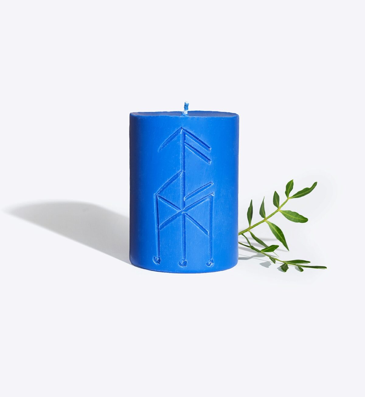 THOR rune candle lit, warm glow for a strength ritual