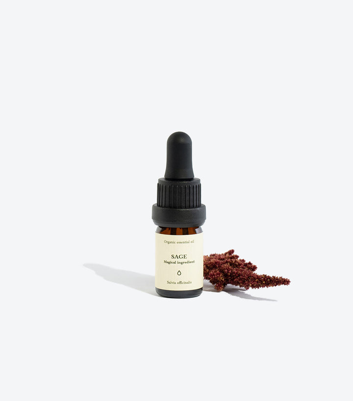 Sage essential oil bottle, front view