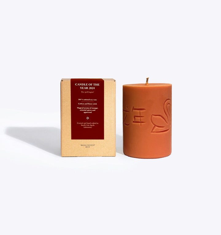 Candle of the Year 2024 with engraved symbols, front view
