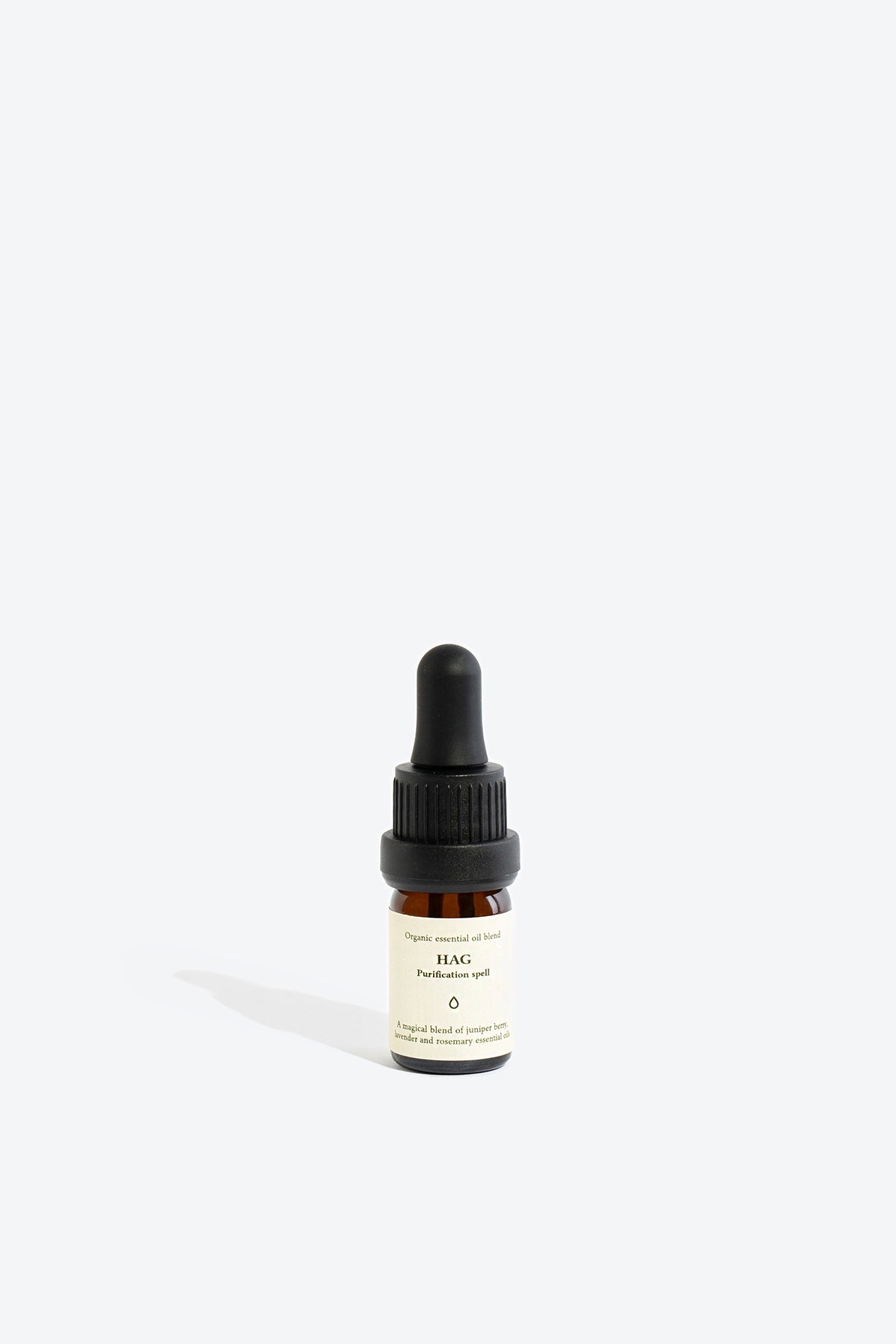 Close-up of HAG essential oil blend bottle and dropper