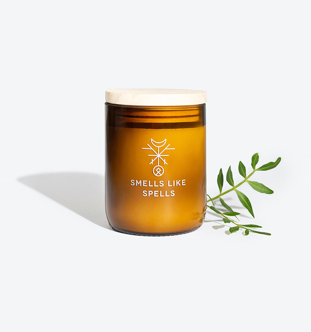 FRIGGA candle lit, warm glow for a home protection ritual