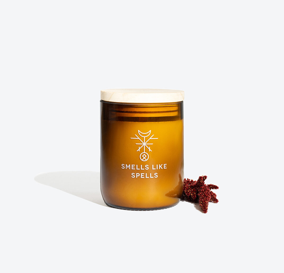 HAG soy wax candle in amber glass jar, front view